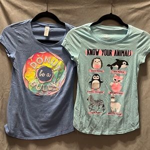 2 Justice short sleeve tops. Size 12